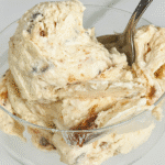 High Protein Salted Caramel Ice Cream Recipe (Delicious & Easy Guide) 5 Creamy high protein salted caramel ice cream in a dessert bowl with visible caramel texture