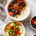 Cottage Cheese Bowls: The Best High-Protein Meal You’re Not Eating 5 Sweet and savory cottage cheese bowls with berries, granola, cherry tomatoes, and cucumbers