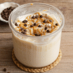 Ninja Creami Cottage Cheese Ice Cream (Better Than Store-Bought!) 7 Ninja Creami cottage cheese ice cream with peanut butter and chocolate chips in a clear pint
